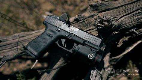 are factory trace laser on hand gun illegel